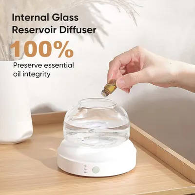 Highlights the internal glass reservoir design that preserves 100% essential oil integrity, reassuring shoppers about product quality and purity.