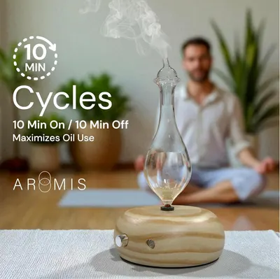 Communicates that the diffuser operates on a 10-minute on/off cycle to maximize oil efficiency and extend usage time.