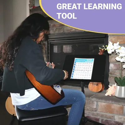 Demonstrates the product as a learning tool for guitar practice, showing it in a real-world home setting to communicate its practical application for music education.