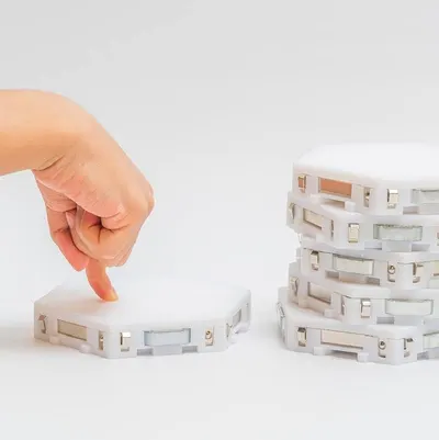Demonstrates that the product features a stackable design for easy storage and space-saving organization.