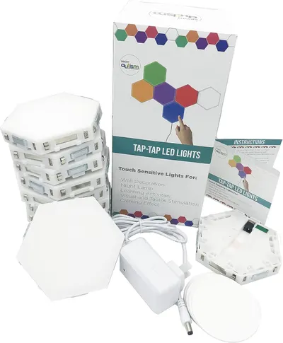 Shows everything included in the package: hexagonal LED light panels, power adapter, cables, instruction manual, and packaging to help shoppers understand the full value of what they receive.