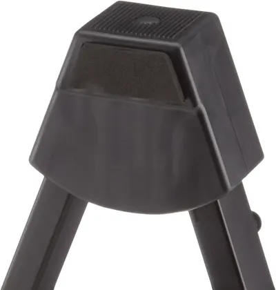 Highlights the physical design features of the product including the non-slip padded surface, ventilation grills on top, and stable leg structure to show build quality and functional components.