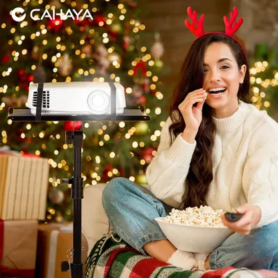 Positions the projector as a perfect gift or entertainment solution for the Christmas holiday season, creating emotional relevance and gift-giving appeal. Demonstrates the projector being used for…