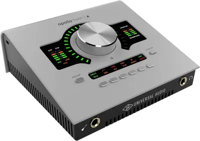 This image showcases the audio interface's control panel layout, highlighting the volume knob, LED level meters, input selection buttons, and connectivity ports to help shoppers understand the…