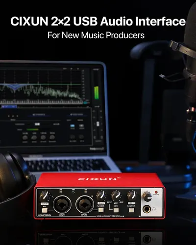 Demonstrates the audio interface in a real music production environment to show new producers how the product fits into their workflow with laptop, headphones, and recording equipment.