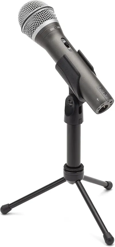 Shows the customer what is included in the package: the microphone, adjustable clip mount, and tripod stand, helping them understand the complete setup they will receive.