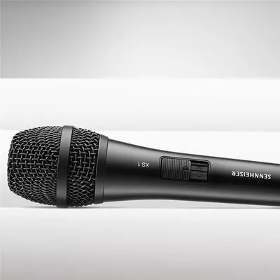 Displays the microphone in a clean, professional setting to help shoppers visualize the product and its design details without overlaid text or feature callouts.