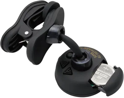 Shows the physical structure and components of the mounting device, including the clip mechanism and battery unit, to help shoppers understand how the product is constructed and assembled.