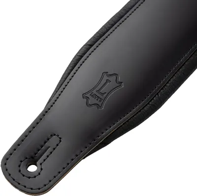 Highlights the premium leather construction and craftsmanship of the product through close-up detail, emphasizing quality and durability to reassure shoppers of the product's value.