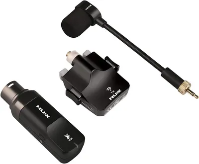 Shows all the components included in the wireless audio system package so shoppers understand what they receive: transmitter, receiver, microphone, and connecting cable.