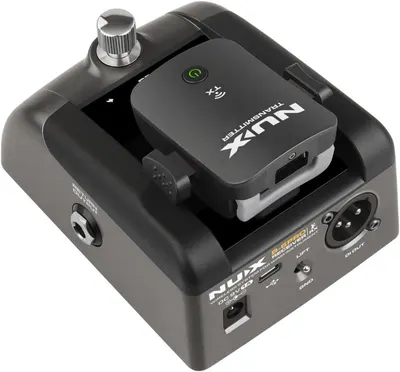 Shows the physical components and layout of the audio transmitter device, highlighting the wireless module, control knob, and various input/output ports to help shoppers understand the product…