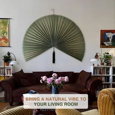 Demonstrates the product as a decorative wall piece in a real-world living room setting to help shoppers visualize how it enhances home aesthetics with a natural vibe.