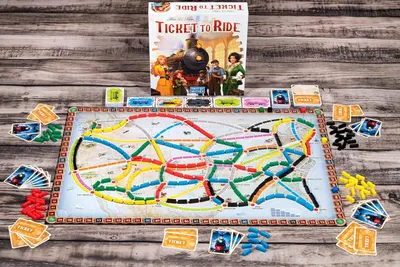 Shows all the components included in the Ticket to Ride board game package, helping shoppers understand the complete contents they will receive and the value of the purchase.