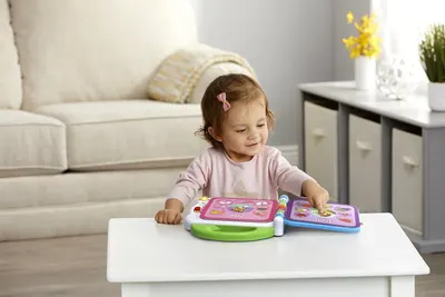 Demonstrates the product being used by a young child in a real home environment to help parents visualize how their child would interact with and enjoy the toy.
