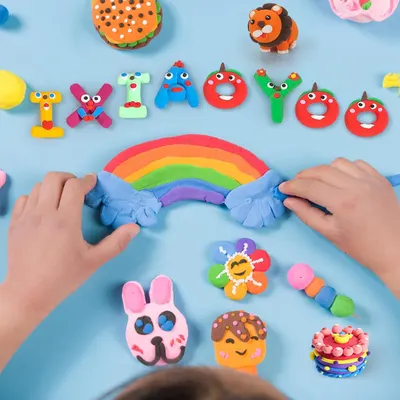 Shows real user engagement with the product in a home setting, demonstrating that children can create colorful, fun clay figures and designs, building trust through authentic customer use.