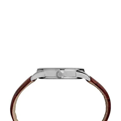 Displays the watch from a side profile angle to show the case thickness, crown detail, and strap attachment, helping shoppers understand the product's physical dimensions and design from an…