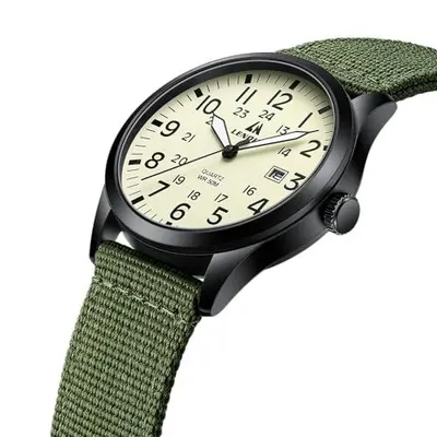 Displays the watch clearly on a white background to show the product design, dial details, and green canvas strap without distractions.