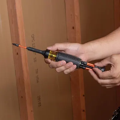 Demonstrates the product being used in a real-world construction/installation setting to help shoppers visualize practical application and build confidence in the tool's functionality.