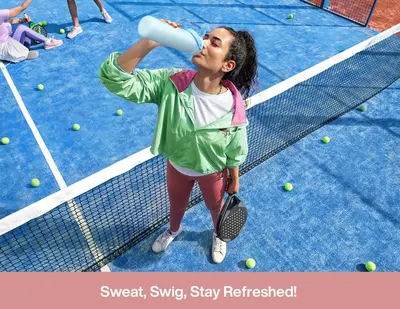 Demonstrates the product in a real-world sports/active lifestyle context to help shoppers visualize using it during physical activities like tennis or paddle sports.