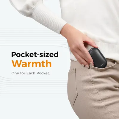 Demonstrates the compact, pocket-sized design of the hand warmer to emphasize its portability and convenience for on-the-go warmth.