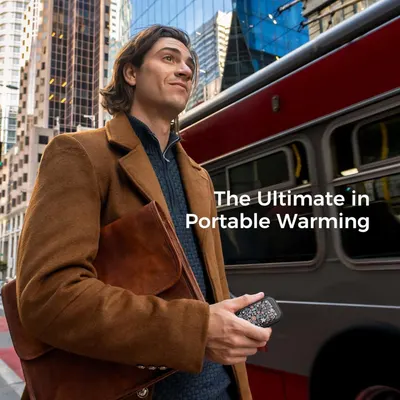 Demonstrates the product in a real-world urban commuting context to show its portability and everyday use case, positioning it as ideal for on-the-go warming.