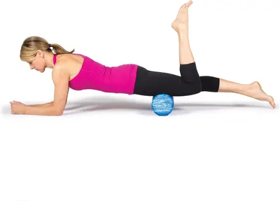 Demonstrates how to properly use the foam roller for exercise and muscle recovery, showing correct body positioning and technique. Shows the product in use during a fitness exercise to communicate…