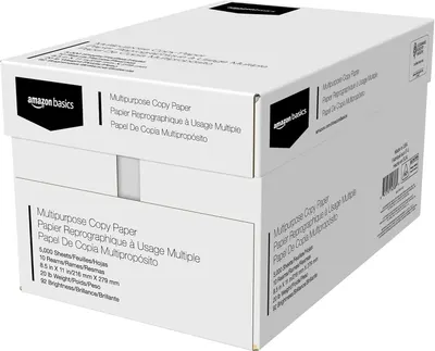 Displays the Amazon Basics multipurpose copy paper product in its retail packaging on a clean white background, providing a clear catalog-style view of what the customer will receive.