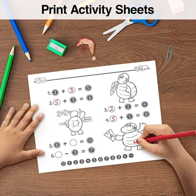 Shows the product being used in a real-world educational context with children's hands actively engaging with the activity sheet, demonstrating practical application and appeal to parents.