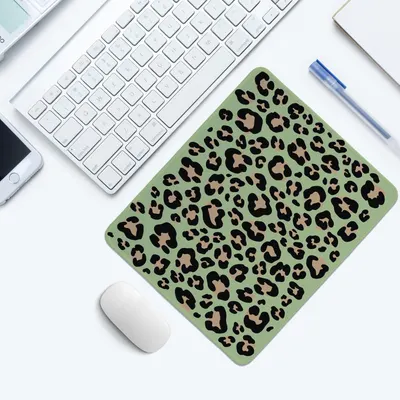 Shows the mouse pad in a real-world office or workspace setting to help shoppers visualize how the product fits into their daily environment.