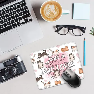 Showcases the product (mouse pad) in a real-world office/workspace environment to help shoppers visualize how it fits into their daily life and work setup.