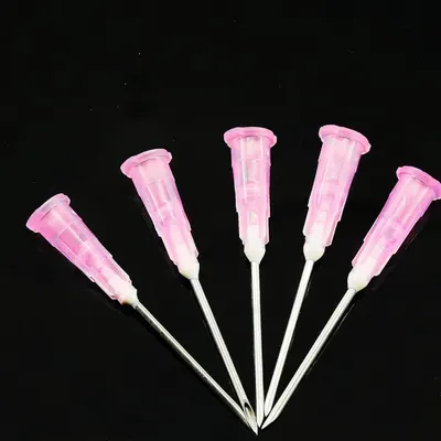 Provides a clean, catalog-style view of the product (pink dispensing needles/tips) against a neutral background to show the product clearly without distractions.