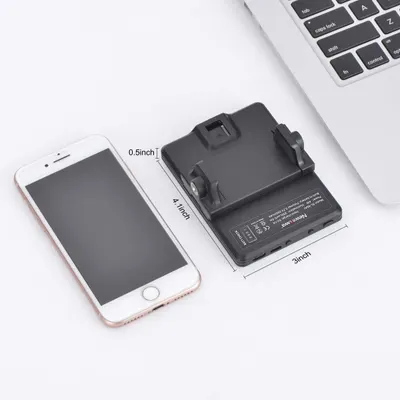 Demonstrates the physical size of the product using exact measurements (4.1 inch x 3 inch x 0.5 inch) with a smartphone for scale, helping shoppers understand how compact and portable the device is.