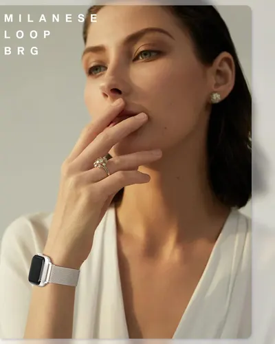 Showcases the jewelry products (ring, earrings, watch band) in an aspirational lifestyle context to help shoppers visualize how the pieces look when worn in a sophisticated, real-world setting.