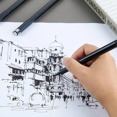Demonstrates the product being used in a real-world creative context, showing the pen's capability for detailed architectural sketching to appeal to artists and illustrators.