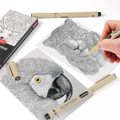 Shows the product being used in a real-world creative context to help shoppers visualize themselves using the pens for detailed artwork and understand the precision and quality achievable with these…