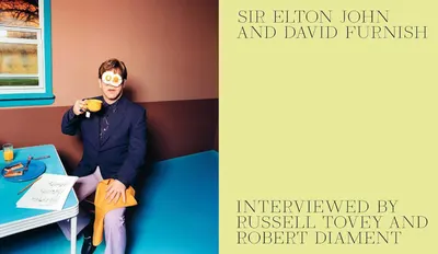 Establishes the brand identity and credibility of the product by prominently featuring Sir Elton John and David Furnish as the authors/creators, along with the interviewers, positioning this as a…