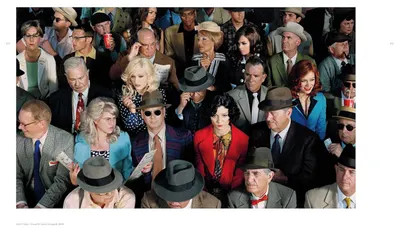 This image shows real people in a crowd setting, appearing to be at a racing or sporting event, to build authenticity and social proof by demonstrating that diverse real customers use and enjoy the…