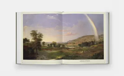 Displays the product (art book or print) in a real-world context to help shoppers visualize the quality and aesthetic of the artwork without any text overlay or feature callouts.
