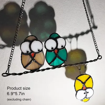 Communicates the exact physical size of the product (6.9 x 5.7 inches excluding chain) to help shoppers understand how large the decorative bird ornament will be when displayed.