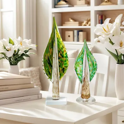 Showcases the decorative glass art pieces in a beautifully styled home environment to help shoppers visualize how the product enhances their living space.