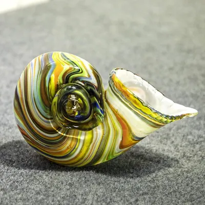 Provides a clear, distraction-free view of the decorative glass snail figurine, allowing shoppers to appreciate its intricate swirled colors and craftsmanship without any text or design elements.