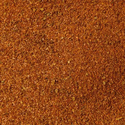 Displays the fine texture and composition of the spice blend or seasoning product to help shoppers visualize the product quality and consistency.