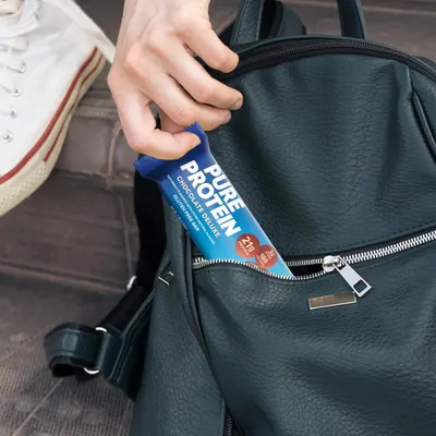 Demonstrates the product's portability and convenience by showing it being easily stored in a bag for travel or daily use.