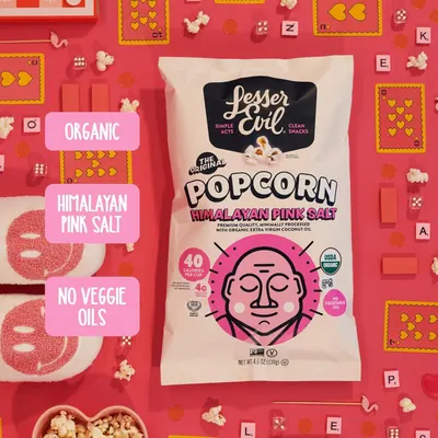 Communicates multiple key product benefits in a visually segmented layout to reassure health-conscious shoppers that this popcorn is made with clean, premium ingredients.