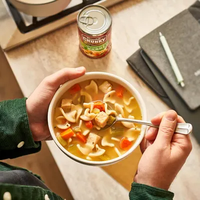 Demonstrates the product being enjoyed in an authentic, everyday setting to help shoppers visualize the product in their own lives and create an emotional connection.