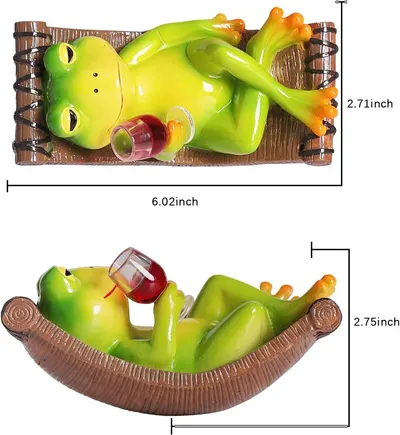 Communicates the exact physical size of the product using dimension measurements to help shoppers understand how big the decorative frog figurine is.