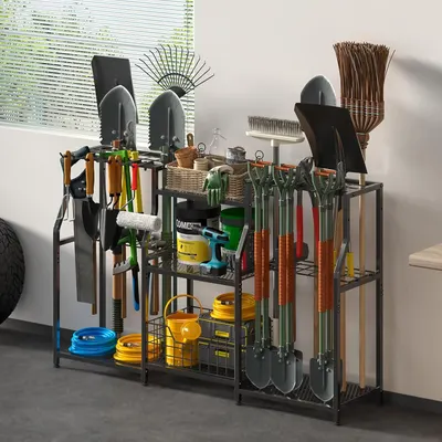 Demonstrates the product in a real-world garage or utility room setting, showing how it organizes and stores various gardening and yard tools in an attractive, functional way.