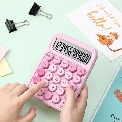 Shows the calculator in a real-world office or study environment to help shoppers visualize the product in their own workspace.