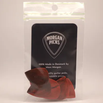 Communicates the brand identity and heritage of Morgan Picks, emphasizing Danish craftsmanship and positioning the product as quality guitar picks at reasonable prices.