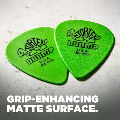 Highlights the matte surface texture of the guitar picks to communicate improved grip and control during playing.